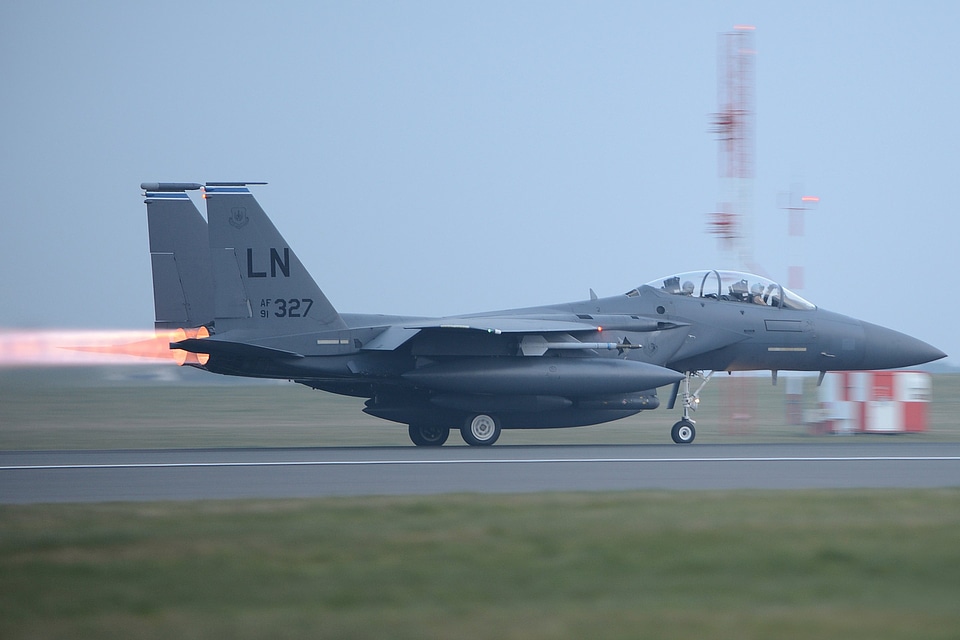 An F-15E Strike Eagle takes off from the flightline