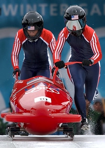 Two female on bobsleigh winter photo
