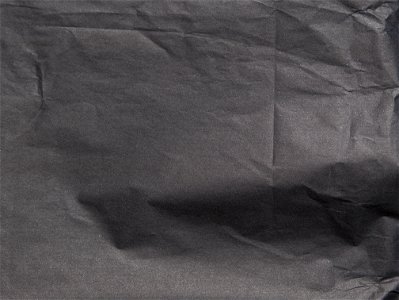 black crumpled paper