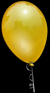 A yellow balloon on a ribbon