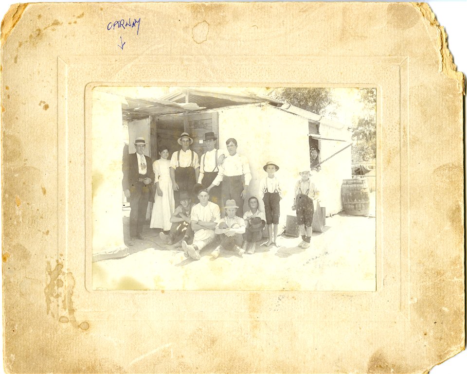 Family outside a house in [Kearsley, NSW], [1910]