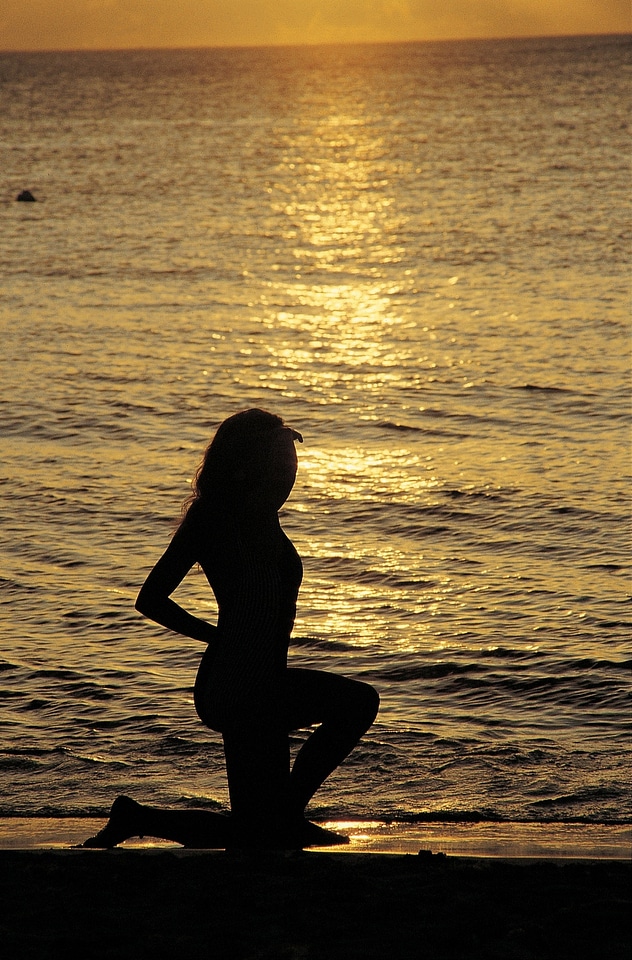 Silhouette of Woman at Sunrise
