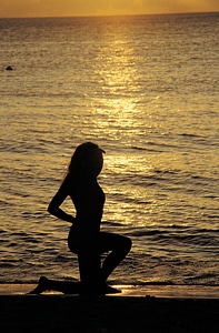 Silhouette of Woman at Sunrise