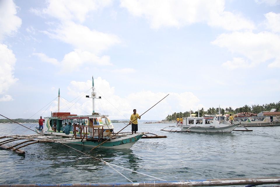 sailboat on perfect tropical white sand beach in Boracay