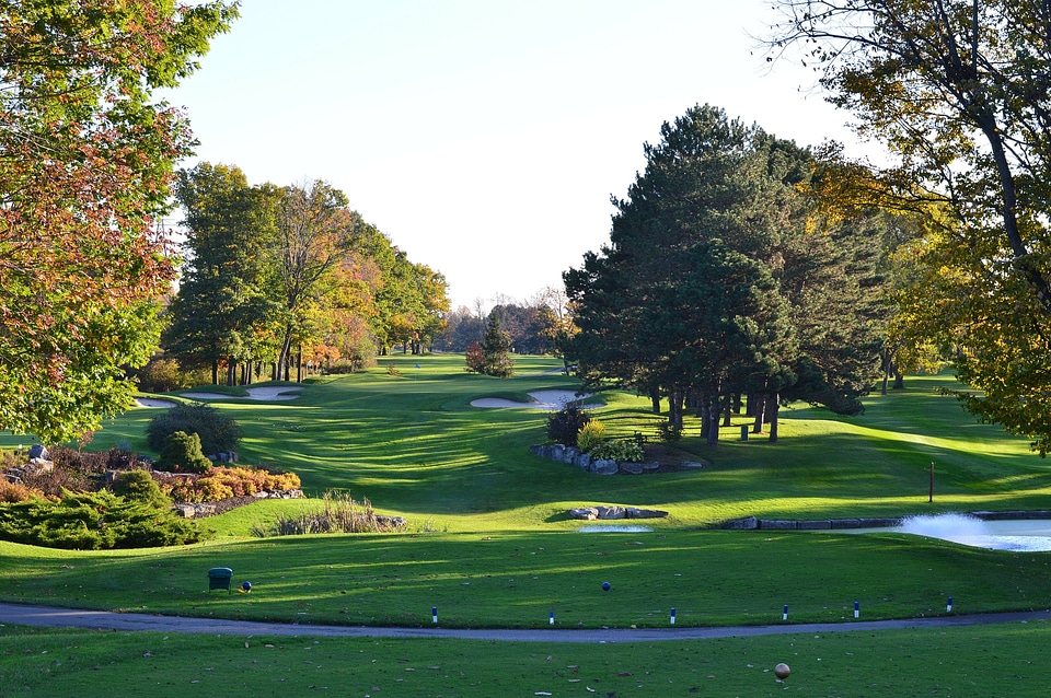 green golf course and blue sky