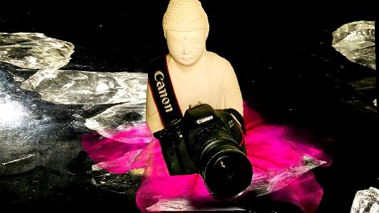 Buddha takes photos photo