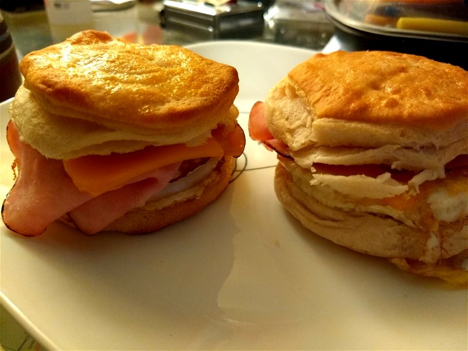 food breakfast sandwhich biscuits egg ham cheese