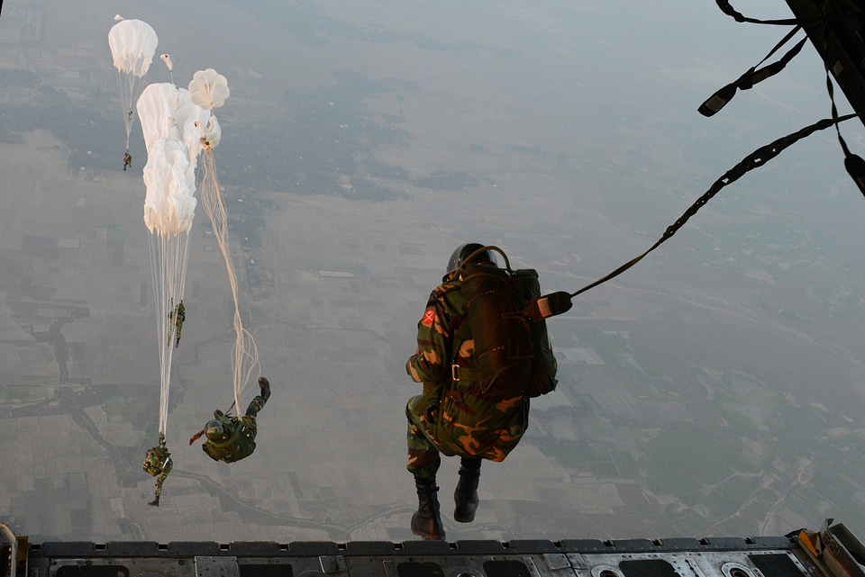 U.S. Air Force C-130H aircraft over a drop zone
