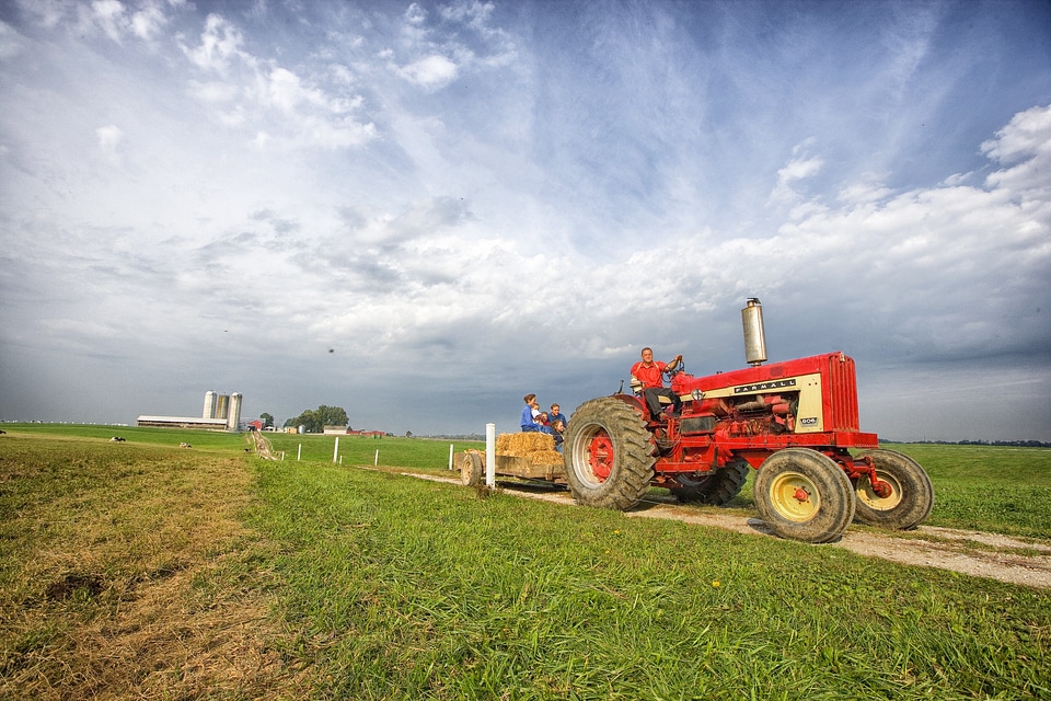 An Ohio farmer loads his grain into the truck trailer