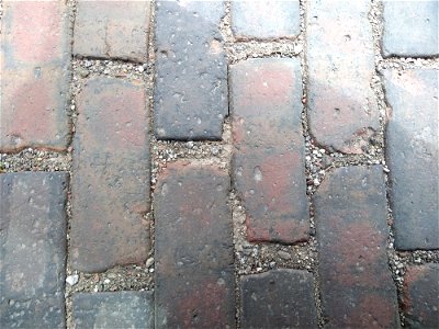 brown brick road street old worn photo