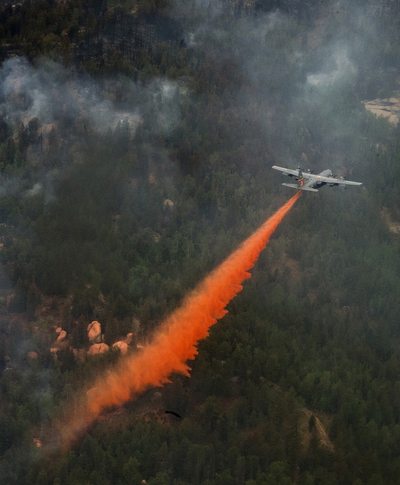 A C-130 Hercules equipped with a Modular Airborne Fire Fighting