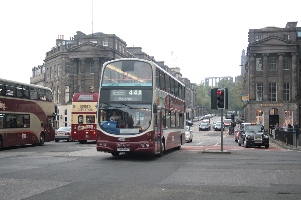 Red double decker on the streets photo