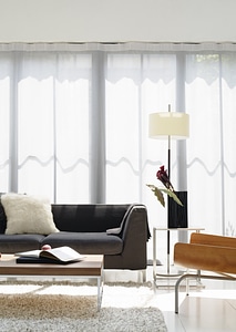 Modern living room design sofa lamp and curtain photo