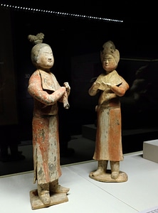 Two female figures in Central Asian dress