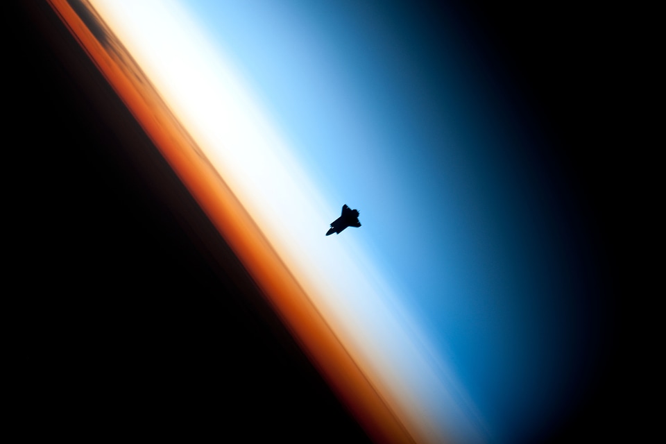 The silhouette of space shuttle Endeavour