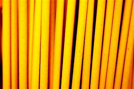Yellow Incense Sticks Wallpaper photo