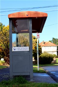 Bus shelter and bus stop sign in Glenpark Avenue, Ngāmotu New Plymouth, Taranaki, New Zealand