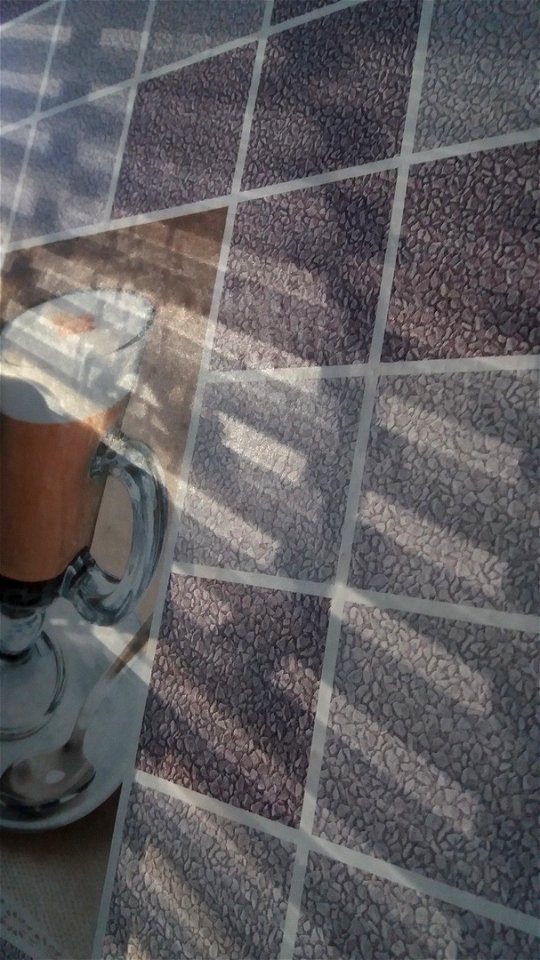Sunlight glare over the wallpaper