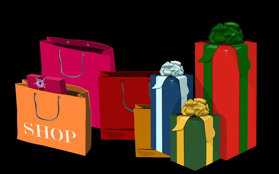 Various sizes of holiday shopping bags and gift boxes