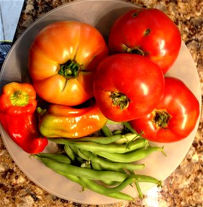 Heirloom tomatoes, peppers, green beans photo
