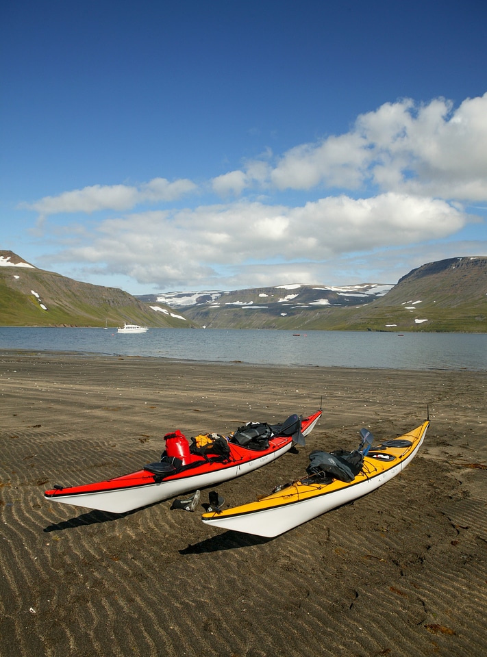 row of kayak on the beach