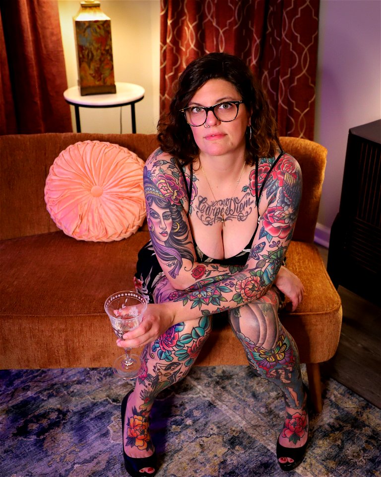 Heavily Tattooed Woman