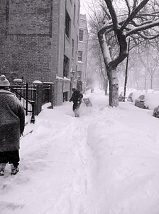 A sidewalk is buried under the snow in Chicago photo