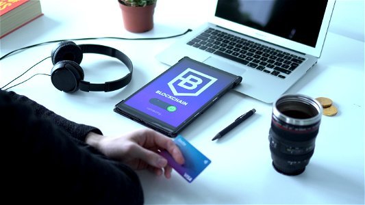 Ecommerce blockchain concept on a tablet photo