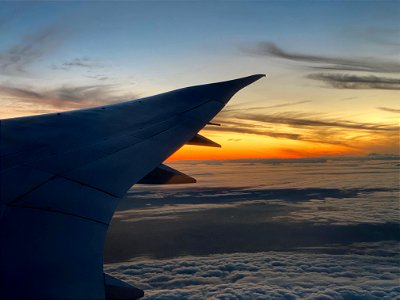 Sunset airplane wing photo