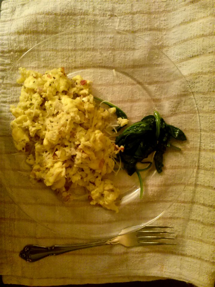 Eggs with ham, cheese, and basil