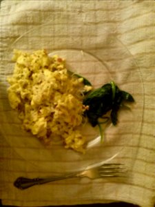 Eggs with ham, cheese, and basil