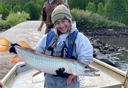 Jazzy Brenner Johnson Poses with a Muskie