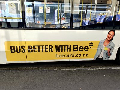 Advertising on side of Citylink in Ngamotu New Plymouth for Bee Card, convenient pre-paid bus card recently introduced, works for all Taranaki buses