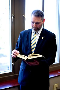 Judge Dietz reading book 3