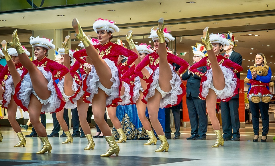 Cheerleader and dancer performing on stage