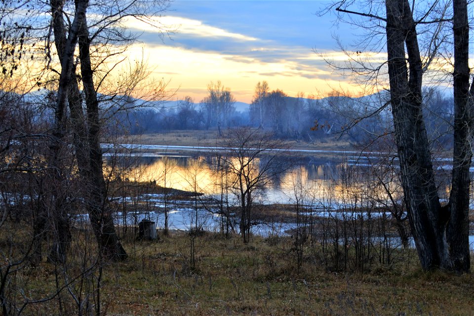autumn sunset on the river photo