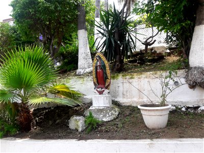 Estatua de la Virgen de Guadalupe photo