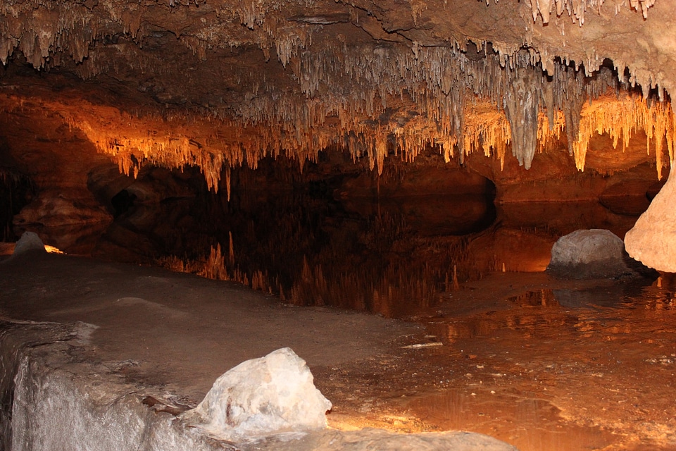 Spelunking cave underground photo