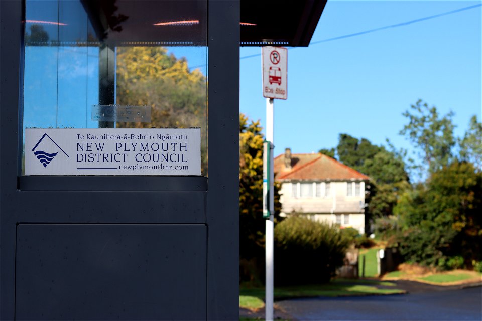 Bus shelter and bus stop sign, Ngāmotu New Plymouth, Taranaki, New Zealand