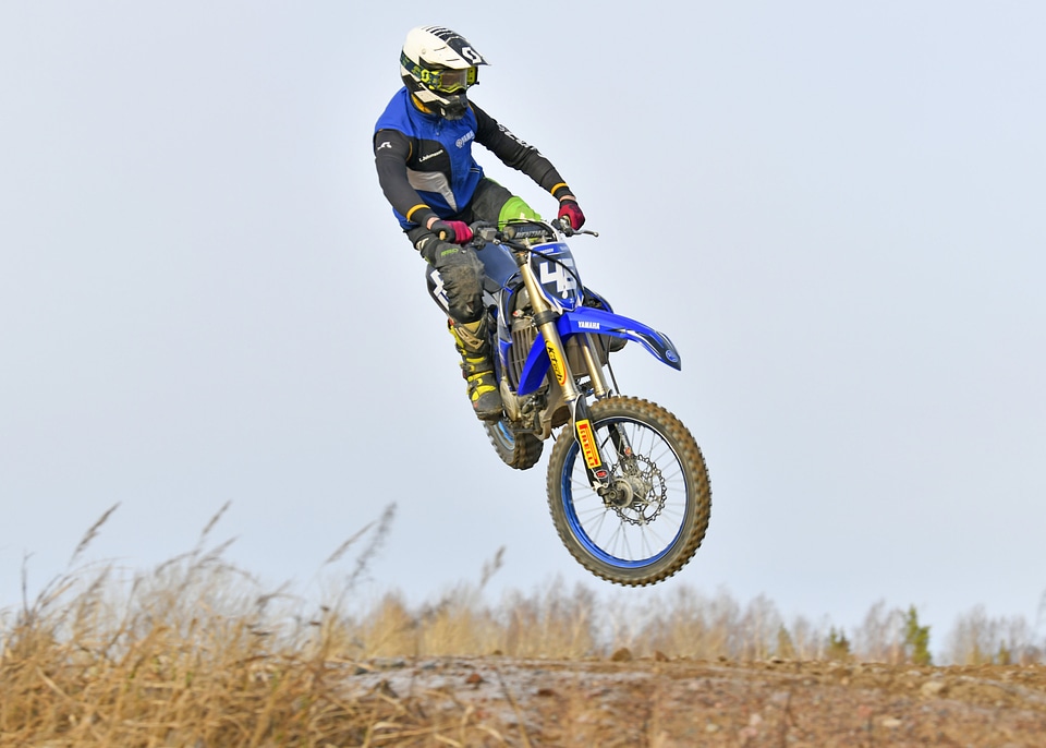 Motocross driver jump in the air