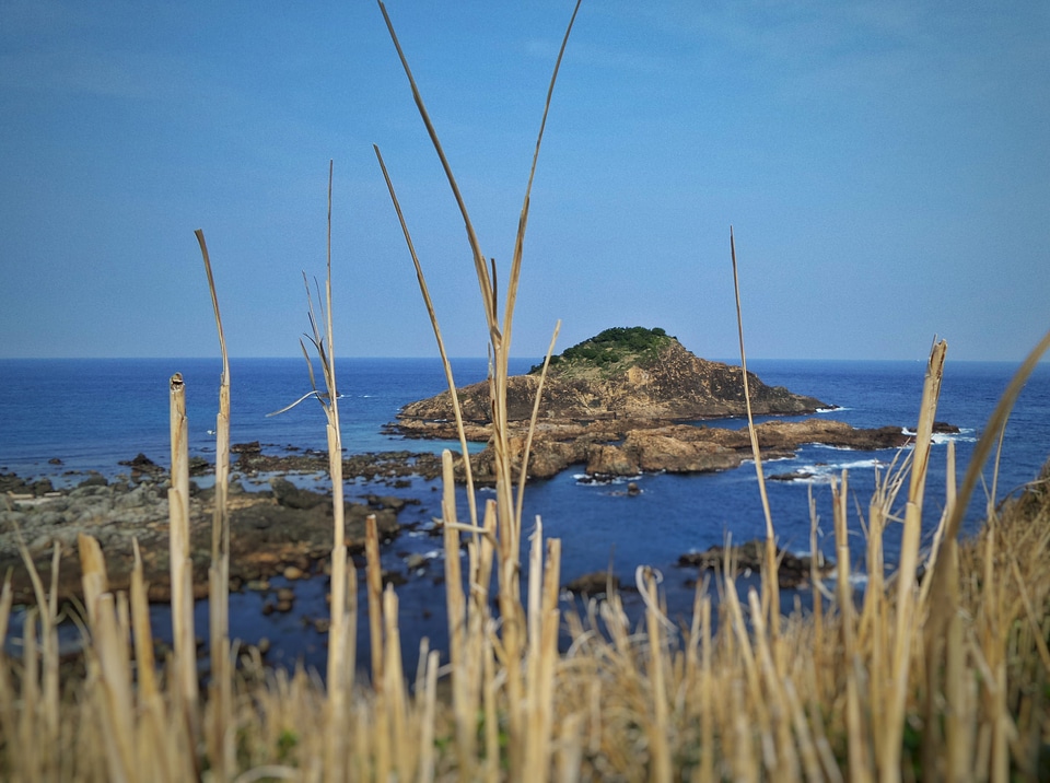 Island in the beautiful blue sky