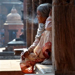 Local lady taking a cigarette break, Bhaktapur, Nepal