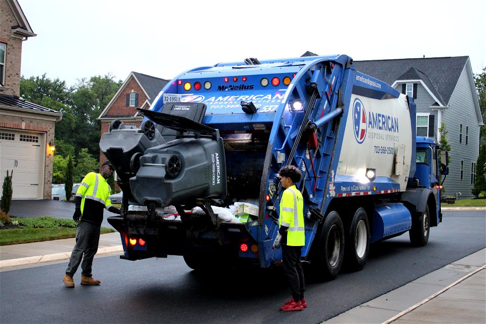 Truck 537 dumping two 96g Toters