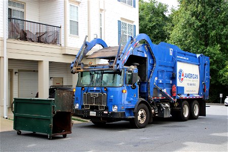 American Disposal truck 167 doing trash in Condos