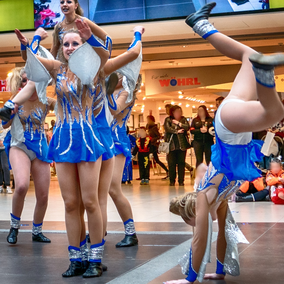 Cheerleader and dancer performing on stage