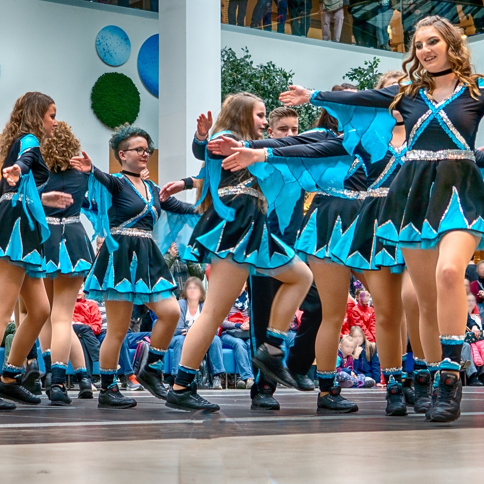 Cheerleader and dancer performing on stage