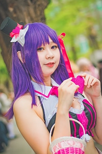 Cute Asian cosplayers dress up as Japanese Manga characters
