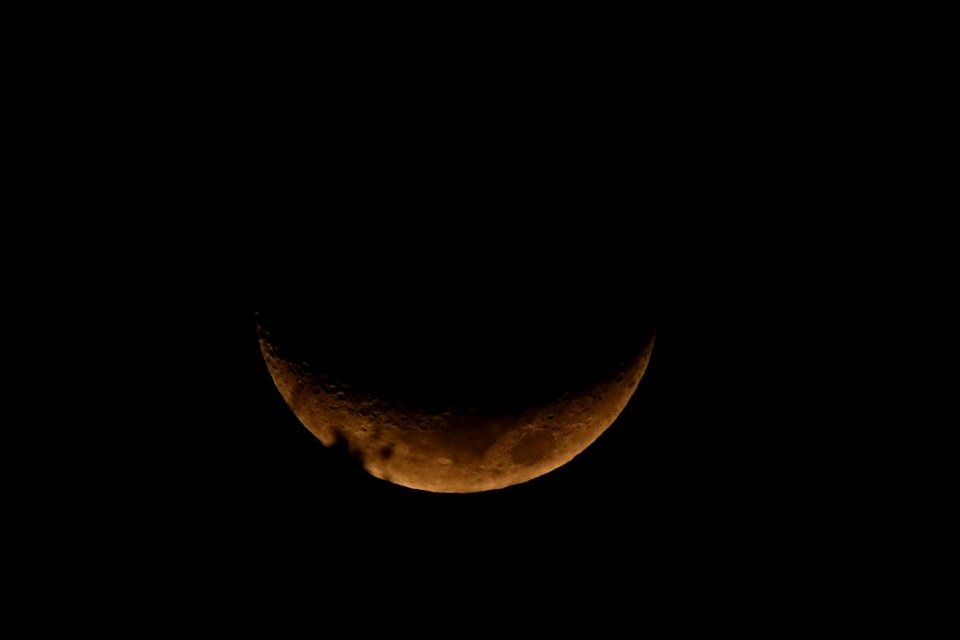 Puesta de Luna en cuarto creciente.