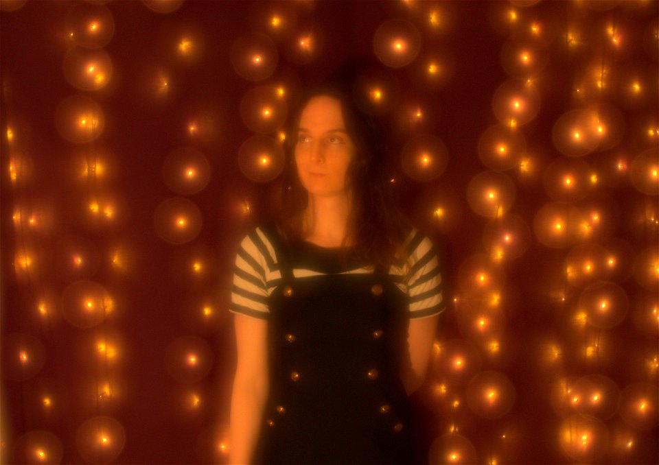 self portrait in fairy lights
