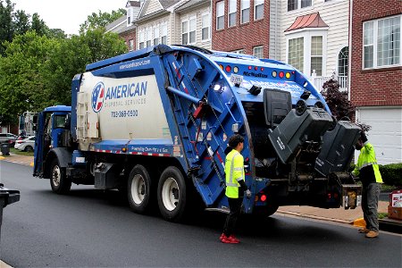 American Disposal truck 537 doing trash | CNG Mack LR Mcneilus RL photo